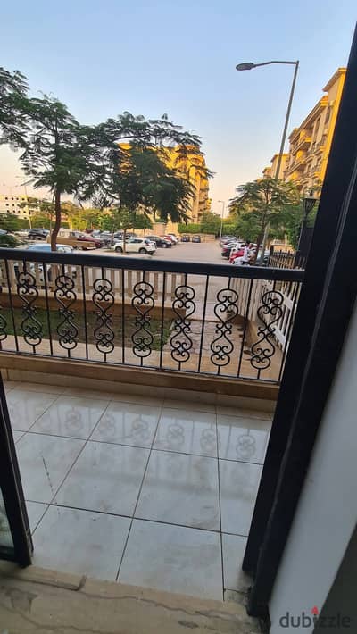 For rent in Al-Rehab 2, a ground floor apartment with a private garden in the seventh phase ready for immediate residence