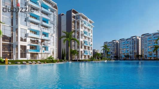 Apartment 104m, two rooms and suitable for 3 rooms in R8, the Administrative Capital directly on the central axis overlooking the largest lagoon, with a down payment of 335 thousand and a monthly installment of 25 thousand for 10 years