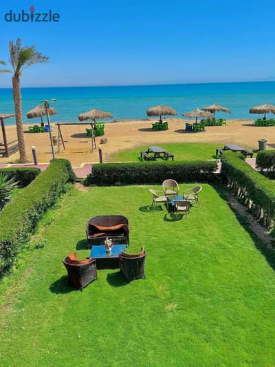 Ground Floor Chalet with Private Garden, First Row on the Sea, Fully Finished with ACs & Kitchen for Sale in Ras El Hekma, North Coast