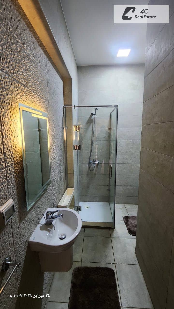 شقة بغرفتي نوم في فيفث سكوير المراسم، صورة ٨ من ١٠