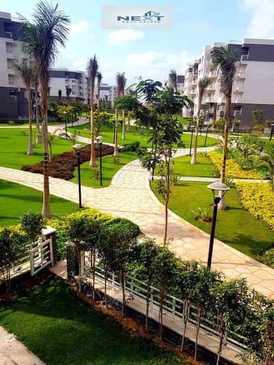 For rent in Madinaty, a new law apartment, 165 sq m, in B10, first floor, first occupancy, company finishing, wide garden view, sea view, very close t