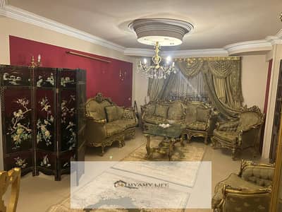 For rent in Gardens of Ahram, a furnished apartment of 190 square meters with a side front balcony consisting of 3 bedrooms, 2 bathrooms, a large reception with a big balcony, and a large kitchen at the first gate.