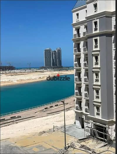 Half price apartment in the Latin Quarter of New Alamein, ready for immediate occupancy, fully finished, sea view, and the towers are ready for viewin
