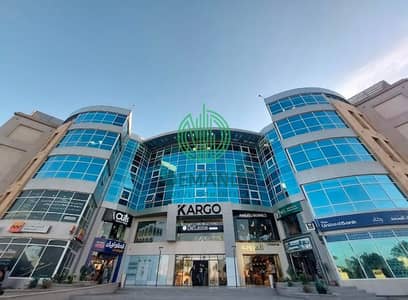محل دور اول خلفى 56 متر  متشطب بالكامل و بالتكييفات للايجار فى الشيخ زايد بمول كارجو علي شارع الشباب الرئيسي مباشرة