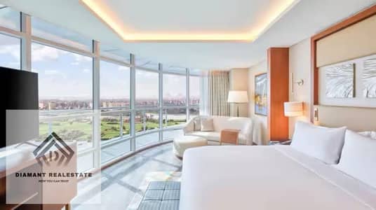 شقه فندقيه للبيع متشطبه بالفرش وخدمات VIP تحت اداره اشهر الفنادق العلميه بعائد 200% وبالتقسيط علي 10 سنين