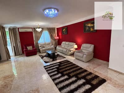 Furnished apartment for rent in Al-Rehab, ground floor with garden, phase four, close to the gateway.