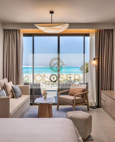 Furnished hotel chalet for sale with a 680,000 down payment, sea view in DOSE, Ras El Hekma, North Coast