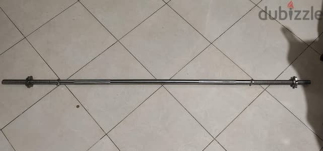 حديد مستقيم وطارات اوزان (20,10,5,2.5kg) حالة ممتازه