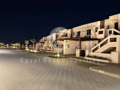 Two-bedroom beachfront chalet for sale in Bait El Bahr with a direct lagoon view. Fully finished chalet with 8-year payment plan. A strong investment