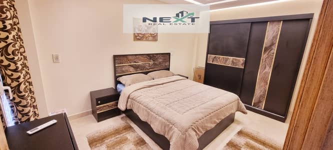Furnished apartment for rent in Madinaty, 107 sq m in B12, ultra-super-lux finishing, garden view, and direct sea access. Very close to services, minu