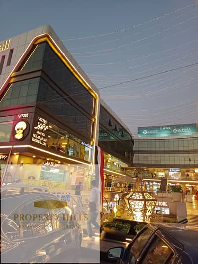 Shop for sale, currently leased and operating under a long-term contract, in the Fifth Settlement, in a fully operational mall.