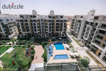 Apartment for sale at the old price, 3 bedrooms, in The Icon compound in New Cairo, directly on 90th Street, minutes from the American University in C