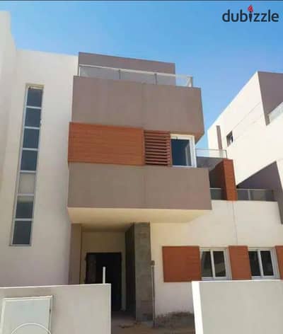 Middle townhouse for sale in Zayed Regency Compound, Sheikh Zayed, opposite Al Ahly Club, next to Karma Compound and Beverly Hills.