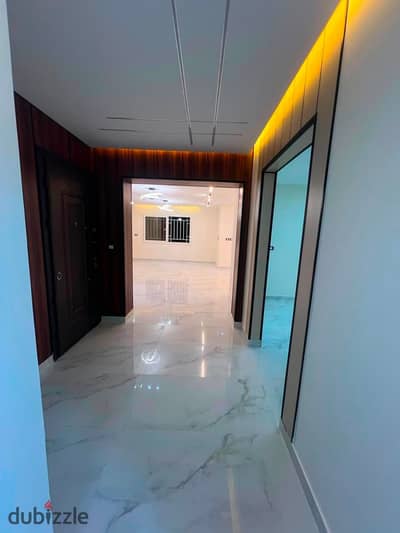 Apartment for sale in Madinaty, ground floor with garden, 4 rooms, 3 bathrooms, villa feeling, ultra-super-lux finishes, cash paid