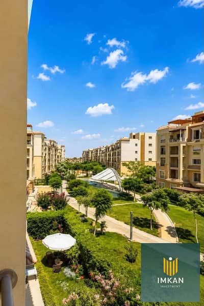 Apartment for sale in Sarai Compound with a 12-year installment plan; ready for viewing, featuring a distinctive north-facing view overlooking the lan