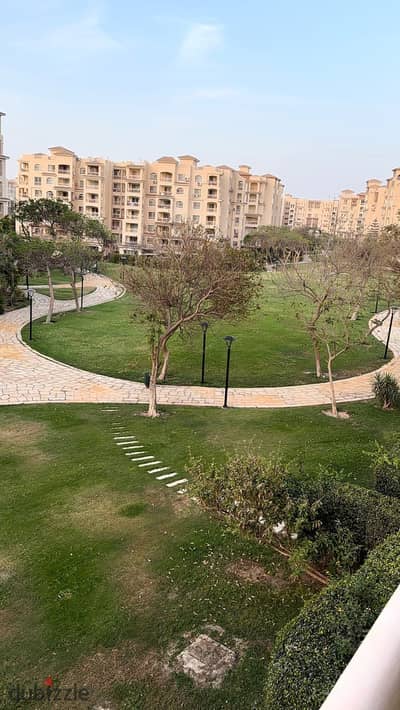 In my city, B2 apartment 107 square meters, garden view, high-quality finishing, footsteps from Open Air Mall, fully paid.