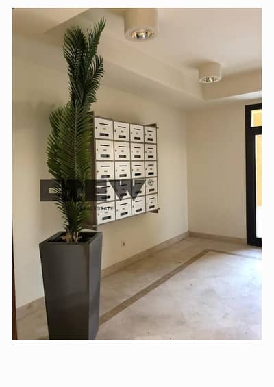 Fully finished apartment for rent—including kitchen and air conditioning—in the Mivida compound, Fifth Settlement. It features an open view landscape