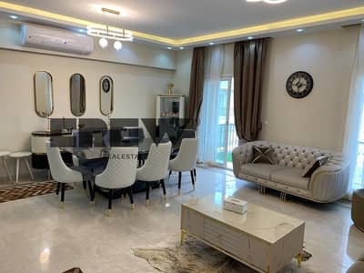 Fully furnished, air-conditioned 3-bedroom apartment for rent in Mivida (Emaar) with a pool view; features an optimal layout and the low monthly rent