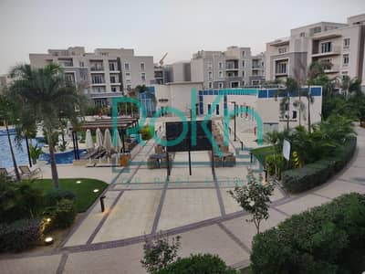 شقه للبيع ب October plaza Sodic view pool