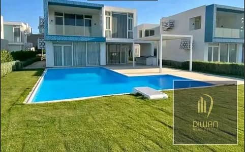 اخر فيلا لقطة متشطبة في فوكا باي الساحل الشمالي بفيو بانورامي علي كريستال لاجون صف اول علي البحر بخصم خاص للكاش