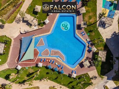 Near AUC, a corner apartment with a sea view on 90th Street in the heart of New Cairo, with installments and no interest.