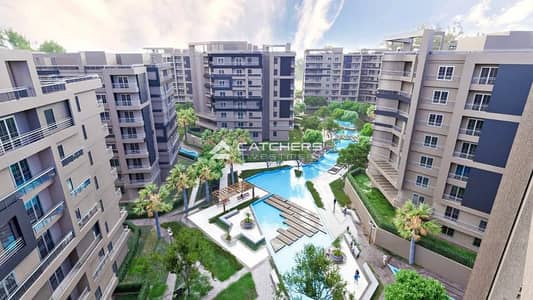Apartment with garden for sale, immediate delivery, in the heart of the New Capital - specifically in R7, opposite the Diplomatic Quart