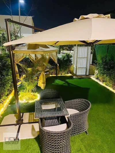 شقة ارضي بجاردن متشطبة بالكامل في كمبوند Taj city استلام فوري جاهزة علي الاستلام