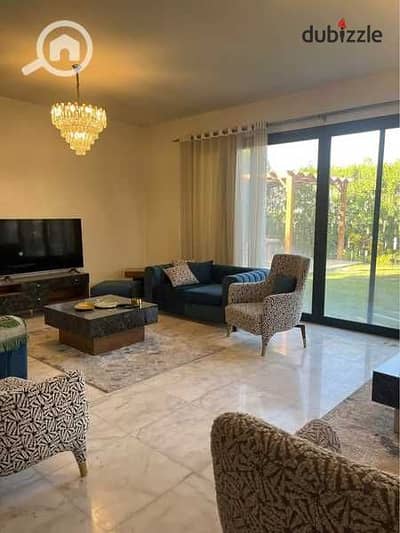 Apartment 115m with garden for sale in the most prestigious compound in New Cairo, in a prime location opposite Cairo Airport, minutes from Heliopolis
