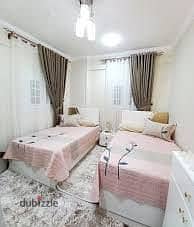 Rooftop 200 m furnished for annual rent family or company 3 bedrooms reception two pieces kitchen bathroom floor 11 all facilities available water and electricity and elevator in Alexandria Alagami kilo 21 October entrance before the gate in a very distinctive location