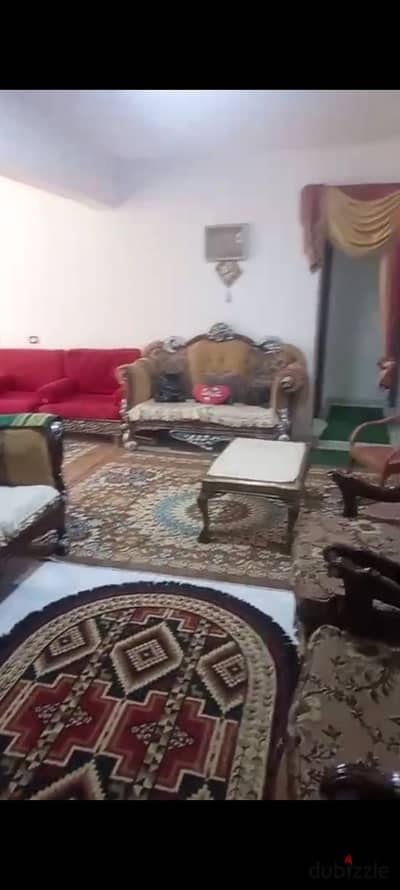 Furnished apartment for annual rent, family, newlyweds, or company, 2 bedrooms, reception two pieces, kitchen, bathroom, fifth floor, upper, very comfortable stairs, all facilities available: water and electricity in Alexandria, Al-Ajami, kilo 21, first entrance to October before the gate, in a very distinguished location.