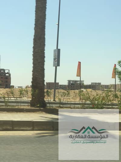 Land for sale 530 meters designated for a double façade building steps to the Badia compound in Palm Hills