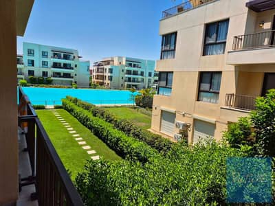 A distinctive chalet with a wonderful view of the lagoon, featuring two bedrooms and 2 bathrooms, located in a prime location close to all amenities and the beach, making it an ideal choice for enjoyment or 