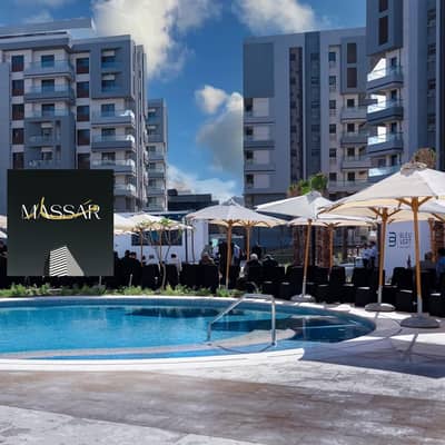 Immediate-delivery apartment with a prime view on a main road in the New Administrative Capital.