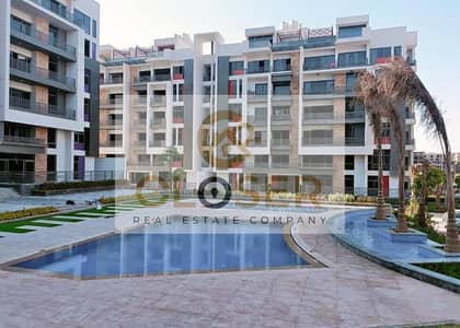 Apartment in a Prime Location Near ( AUC ) in an Inhabited, Fully Serviced Compound + Longest Payment Plan in the Market