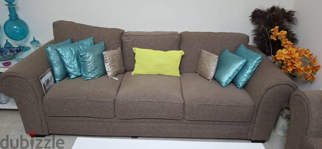 4 seater sofa and central table