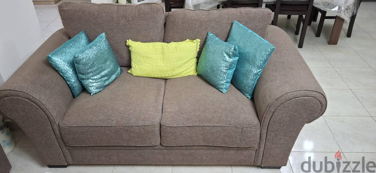 4 seater sofa and central table 1