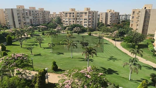 Apartment with an excellent location and view in Madinaty B11
