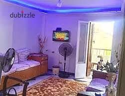 Furnished apartment for annual rent for a family or a groom or a company 3 bedrooms reception two pieces kitchen bathroom fourth floor upper very comfortable stairs in Alexandria Al-Ajmi kilo 21 October entrance before the gate in a very distinguished location