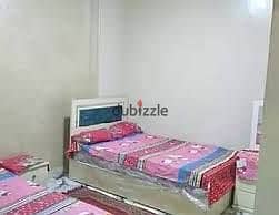 Furnished apartment for annual rent for family, groom, or company, 3 bedrooms, reception area, 2 pieces, kitchen, bathroom, on the fifth floor, upper, very comfortable stairs, in Alexandria, Al-Ajami, kilo 21, entrance October, before the gate, in a very distinguished location.