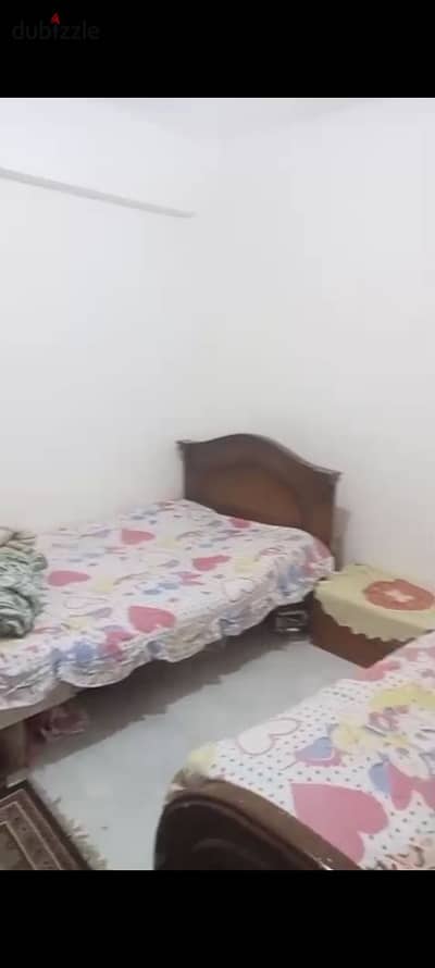 Furnished apartment for annual rent for a family, groom, or company, 2 bedrooms, reception consisting of two pieces, kitchen, bathroom, fifth floor upper, very comfortable stairs, in Alexandria, Al-Ajami, Kilometre 21, October entrance before the gate in a very distinguished location.