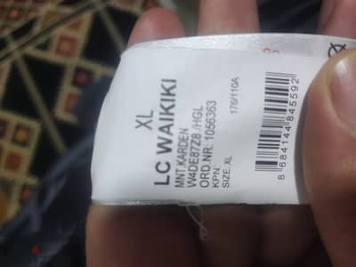 جاكت شتوي LC Waikiki مبطن رمادي مقاس XL بحالة الزيرو
