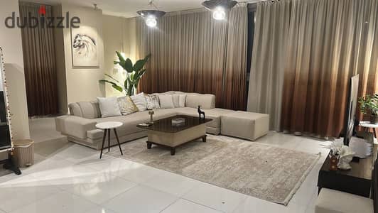 Furnished apartment for rent in One Katameya Compound, hotel-style furnishings, long-term rental.