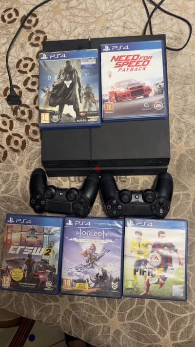 Playstation 4 fat معاه 10 العاب