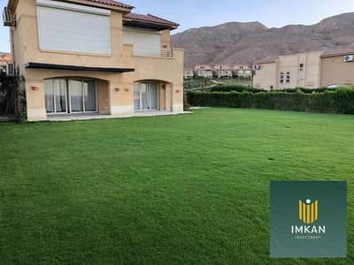 Beachfront chalet for sale at Telal Ain Sokhna, featuring a prime location facing the sea and the lagoon. It comes with super-lux finishing, including