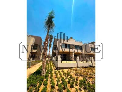 Corner Townhouse Highest elevation landscape view Ready to move with installments at Palm Hills New Cairo