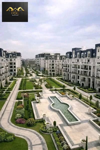 Ground floor apartment with a corner garden in Mountain View iCity, October Landscape view inside the compound  /Area:  m 140 Buildings + m 110 garden