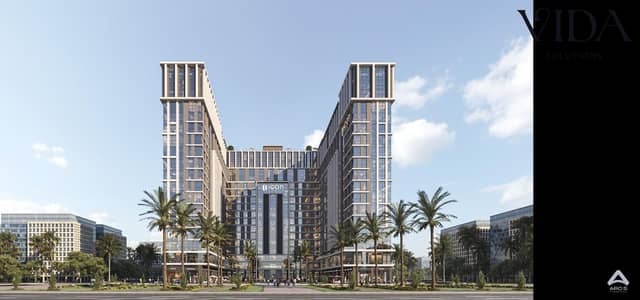 للبيع محل 32 متر علي محور بن زايد مباشر في اهم مشاريع العاصمه الاداريه U icon Tower بالتقسيط علي 12 سنه
