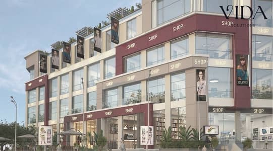 محل تجاري للبيع بمساحة 45,64 مول ميد تاون استلام 6 شهور بحدائق اكتوبر مباشرة على طريق رئيسي بكثافة مرورية وسعر مميز