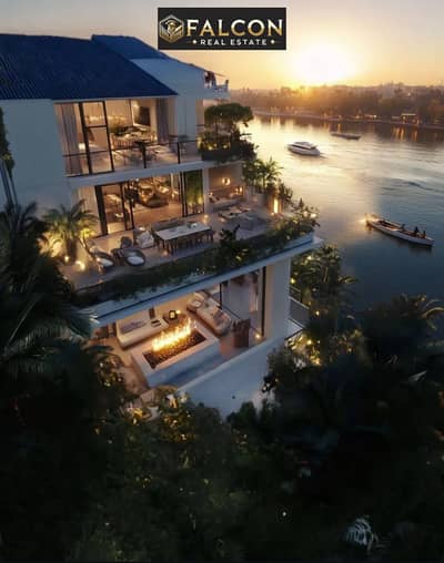 Villa for sale, first row on the Nile in New Zayed, next to SODIC, Emaar, and Sphinx Airport! Installments over 10 years.