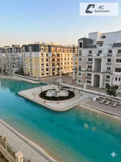 Directly lagoon iVilla Roof 240 m 3 bedrooms for sale in a prime location within the Mountain View iCity compound Fifth Settlement